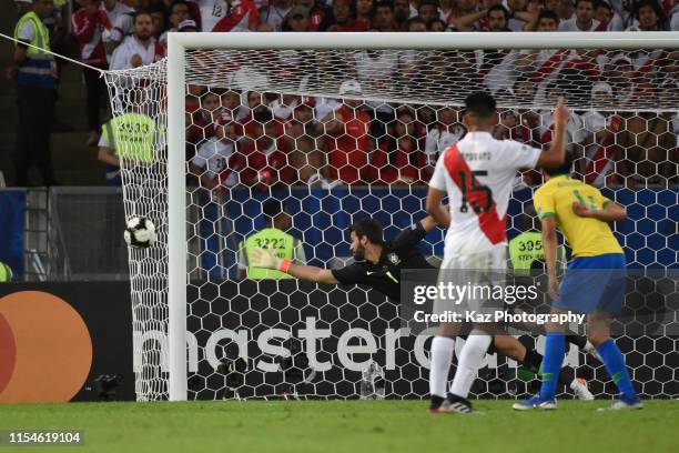 Alisson Becker of Brasil jumpes for the shoots during the Copa America Brazil 2019 Final match between Brazil and Peru at Maracana Stadium on July 7,...