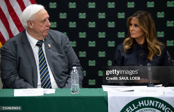 First Lady Melania Trump and West Virginia Governor Jim Justice attend a roundtable discussion on the opioid epidemic with local and state officials...