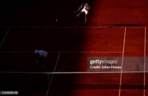 Jeremy Chardy of France and Fabrice Martin of France serves during the mens doubles final against Kevin Krawietz of Germany and partner Andreas Mies...