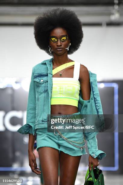 Model walks the runway at the Iceberg show during London Fashion Week Men's June 2019 at the BFC Show Space on June 08, 2019 in London, England.