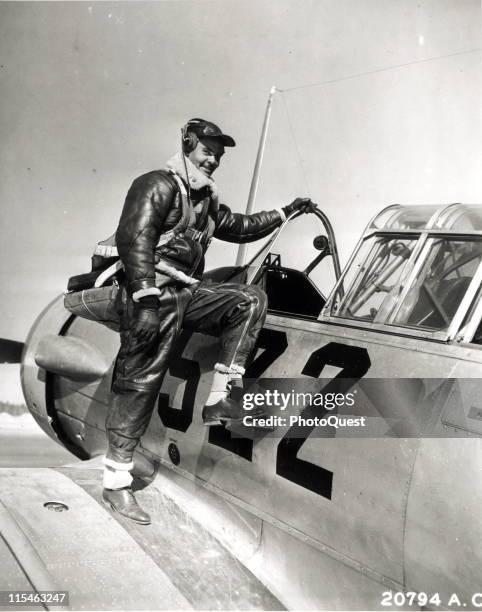 Captain Benjamin Oliver Davis, Jr. Of Washington, DC climbs into an Advance Trainer airplane, Tuskegee, AL, January 1942.