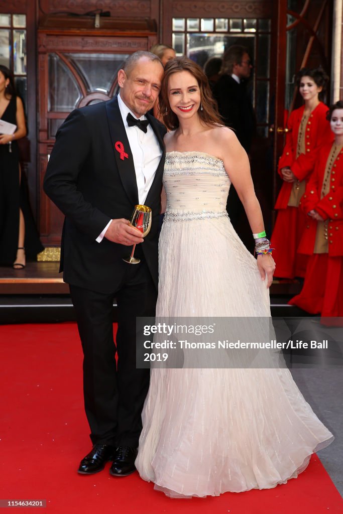 Gery Keszler and Alexandra Roedy attend the LIFE+ Solidarity Gala