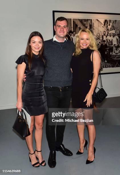 Scarlett Byrne, Cooper Hefner and Pamela Anderson attend Maddox Gallery Los Angeles Presents: Pamela Anderson by David Yarrow at Maddox Gallery on...