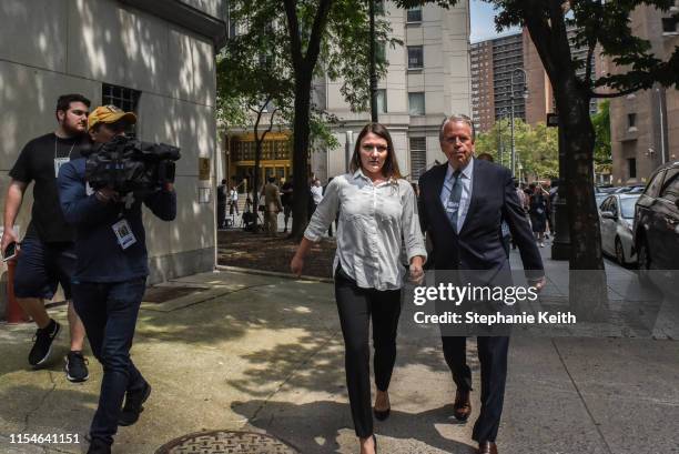 One Jeffrey Epstein's alleged victims, Courtney Wild, exits the courthouse after the billionaire financier appeared for a hearing on July 8, 2019 in...