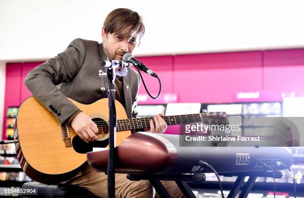 Neil Hannon of Divine Comedy during an instore session to celebrate their new album 'Office Politics' at HMV Manchester on June 08, 2019 in...