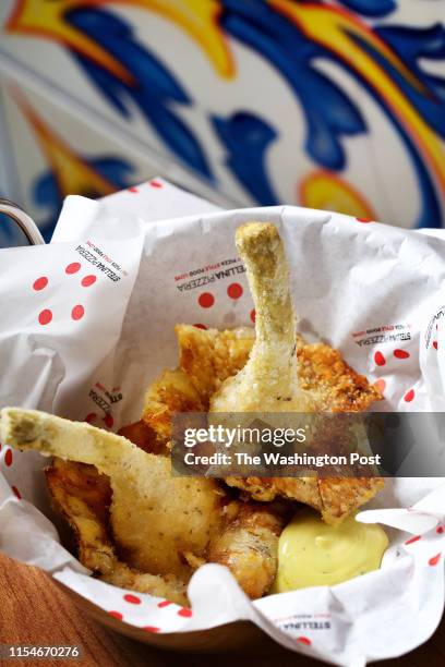 Carciofo alla Romana - Fried Artichokes and Herb Mayonnaise at Stellina Pizzeria in Washington, DC on July 5, 2019. .