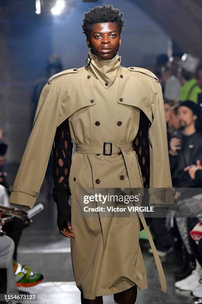Model walks the runway at the John Lawrence Sullivan Ready to Wear Spring/Summer 2020 fashion show during London Fashion Week Men's June 2019 on June...