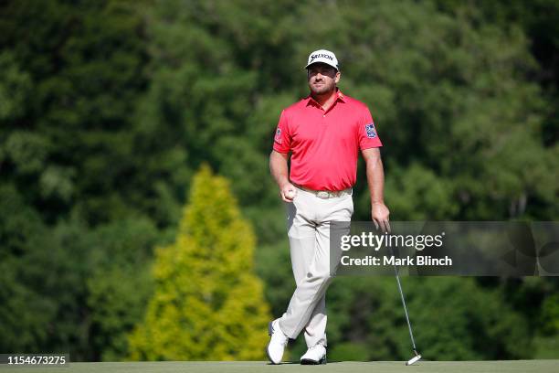 Graeme McDowell of Northern Ireland looks on on the 16th green during the third round of the RBC Canadian Open at Hamilton Golf and Country Club on...