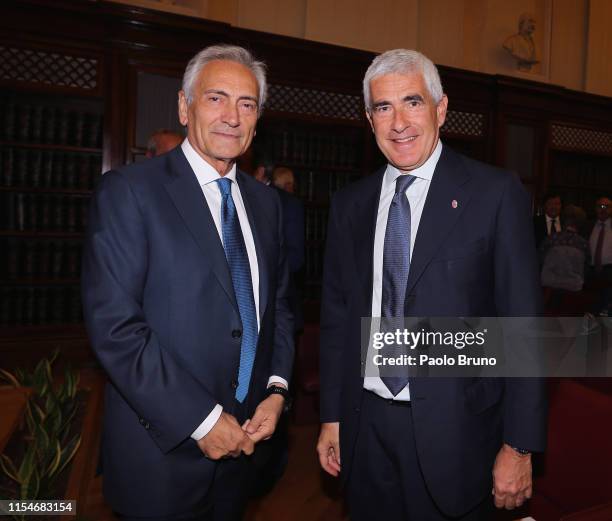 President Gabriele Gravina and the Deputy Pier Ferdinando Casini pose during the Italian Football Federation unveiling annual report at Palazzo...