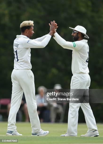 Abidine Sakande of Sussex celebrates taking the wicket of Marcus Harris of Australia A with Varun Chopra during the Sussex v Australia A tour match...