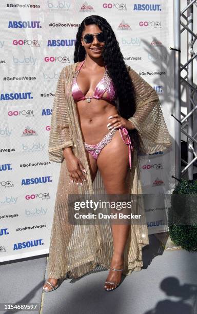 Singer/actress Ashanti poses backstage at the Flamingo Go Pool Dayclub at Flamingo Las Vegas on June 8, 2019 in Las Vegas, Nevada.