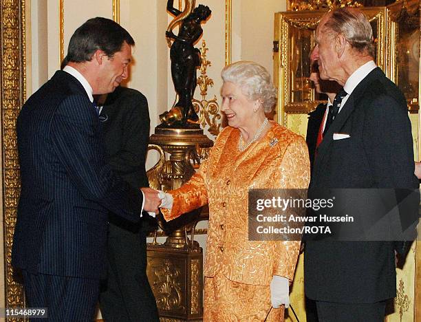 Queen Elizabeth II and Prince Philip, Duke of Edinburgh meet MEP Nigel Farage at a Buckingham Palace reception for backbench MPs on March 20, 2007.