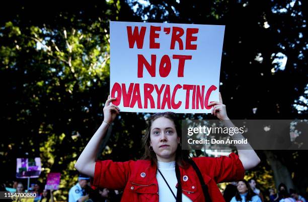 Woman holds up signage at Hyde Park on June 09, 2019 in Sydney, Australia. The march was organised by a Sydney high school student in response to...