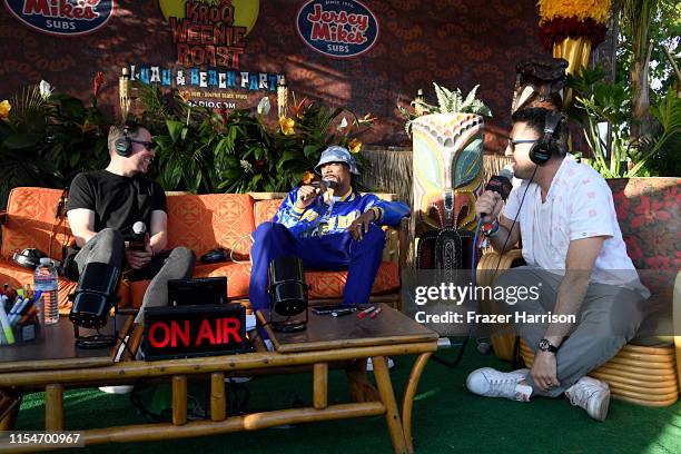 Stryker, DJ Snoopadelic and Klein attend KROQ Weenie Roast & Luau at Doheny State Beach on June 08, 2019 in Dana Point, California.