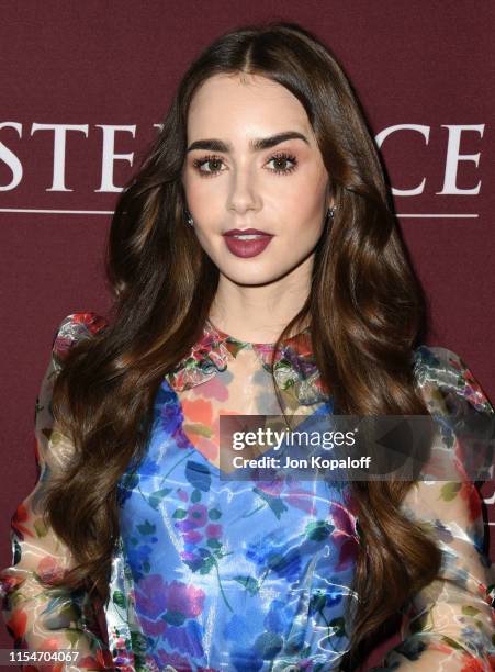 Lily Collins attends Les Misérables Photo Call at Linwood Dunn Theater on June 08, 2019 in Los Angeles, California.