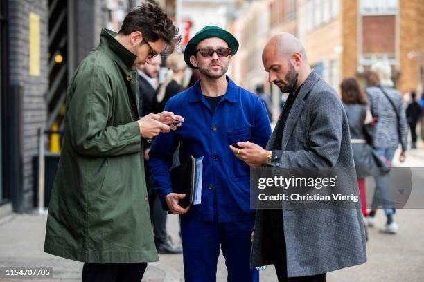 Charlie Teasdale and Finlay Renwick seen during London Fashion Week Men's June 2019 on June 08, 2019 in London, England.