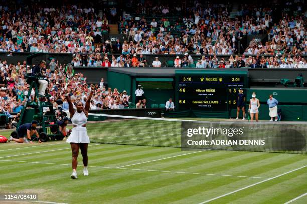 Player Serena Williams celebrates beating US player Alison Riske during their women's singles quarter-final match on day eight of the 2019 Wimbledon...