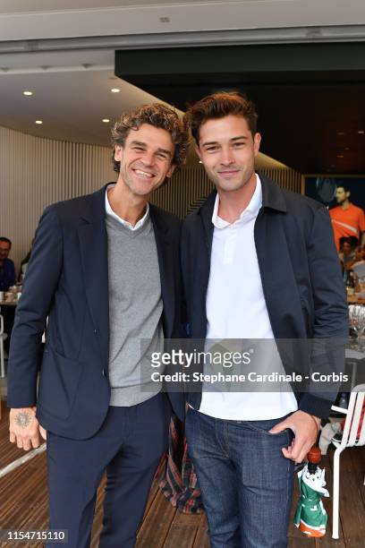 Tennis Player Gustavo Kuerten and Model Francisco Lachowski attend the 2019 French Tennis Open - Day Fourteen at Roland Garros on June 08, 2019 in...