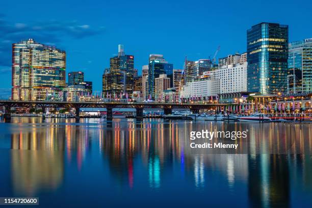 sydney darling harbor cityscape reflections at night australia - restaurant sydney outside stock pictures, royalty-free photos & images