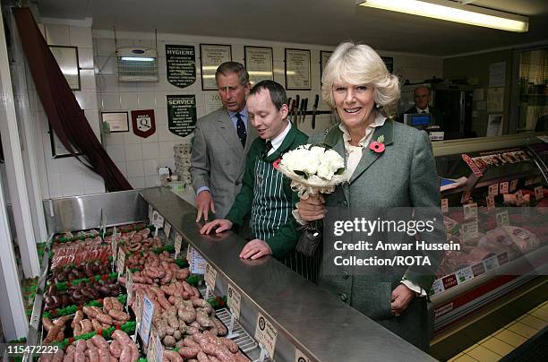 Prince Charles, Prince of Wales and Camilla, Duchess of Cornwall, visit a butchers shop when they vist Northumberland on November 09, 2006