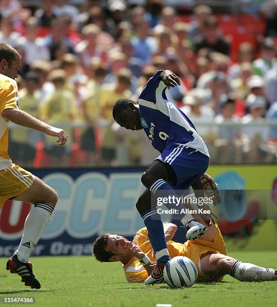 Eastern conference All Star Freddy Adu battles Jeff Agoos from the western conference for the ball during the 2004 MLS All Star Game. The Eastern...