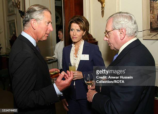 Prince Charles, Prince of Wales speaks to Natasha Kaplinsky and David Starkey during a reception for the Royal Television Society at Clarence House...
