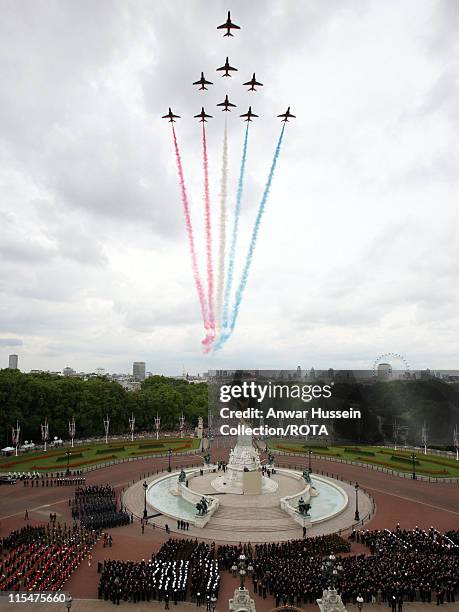 The Red Arrows take part in a fly past along The Mall in London during a service to mark the 25th anniversary of the Falklands war on June 17 2007.