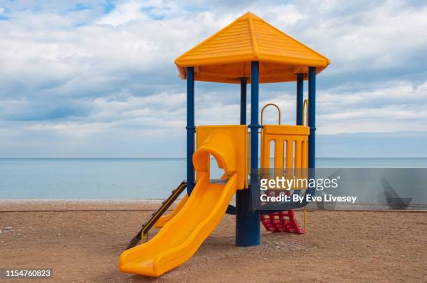 albir beach - playground equipment stock pictures, royalty-free photos & images