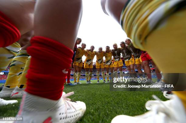 Players of Australia huddle on the pitch prior to the 2019 FIFA Women's World Cup France group C match between Australia and Italy at Stade du...