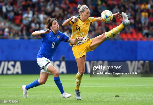 Alanna Kennedy of Australia controls the ball as she is put under pressure by Daniela Sabatino of Italy during the 2019 FIFA Women's World Cup France...