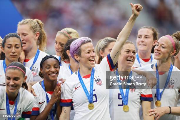 Women's World Cup Final: USA Megan Rapinoe victorious with teammates wearing medals after winning game vs Netherlands at Parc Olympique Lyonnais....