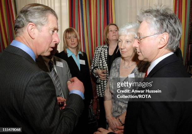 Prince Charles, Prince of Wales chats to Dr, Sam McGuinness and Mrs. Christine Conway during a reception for school cooks at Clarence House on...