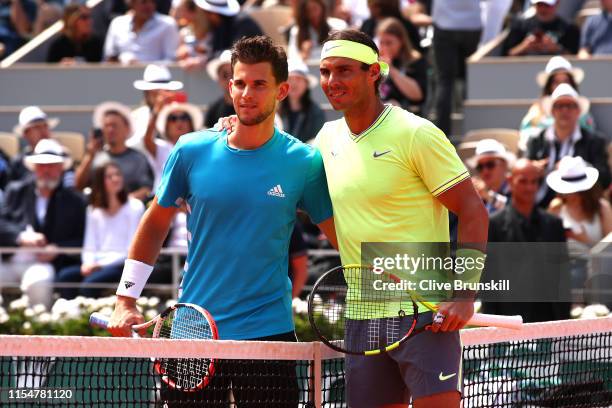 Rafael Nadal of Spain and Dominic Thiem of Austria pose for a photo ahead of their mens singles final during Day fifteen of the 2019 French Open at...
