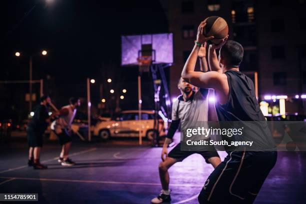 friendly match - basketball teamwork stock pictures, royalty-free photos & images