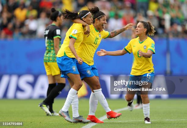 Cristiane of Brazil celebrates with teammates after scoring her team's second goal during the 2019 FIFA Women's World Cup France group C match...