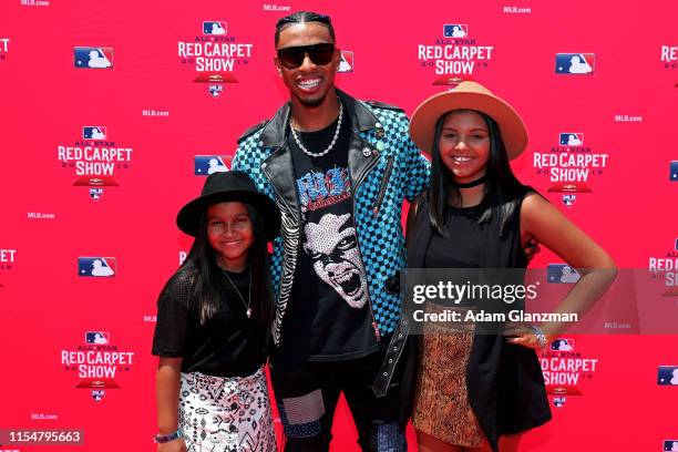 Francisco Lindor of the Cleveland Indians poses for a photo with his family during the MLB Red Carpet Show presented by Chevrolet at Progressive...