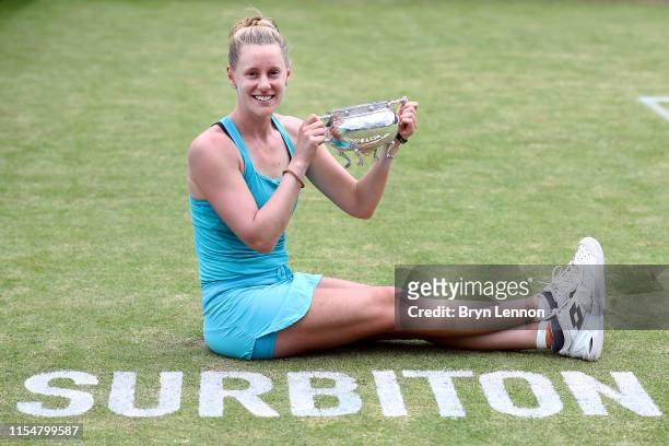 Alison Riske of the USA poses with her trophy after winning the Women's Singles Final on day seven of the Surbiton Trophy at the Surbiton Racquet &...