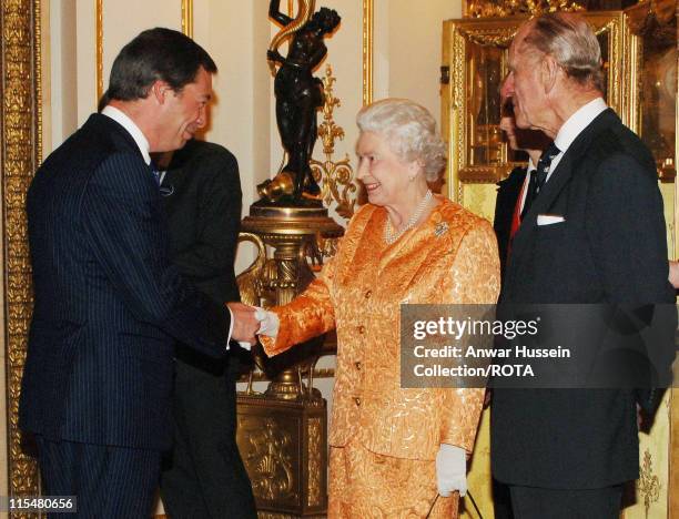 Queen Elizabeth II and Prince Philip, Duke of Edinburgh meet MEP Nigel Farage at a Buckingham Palace reception for backbench MPs on March 20, 2007.