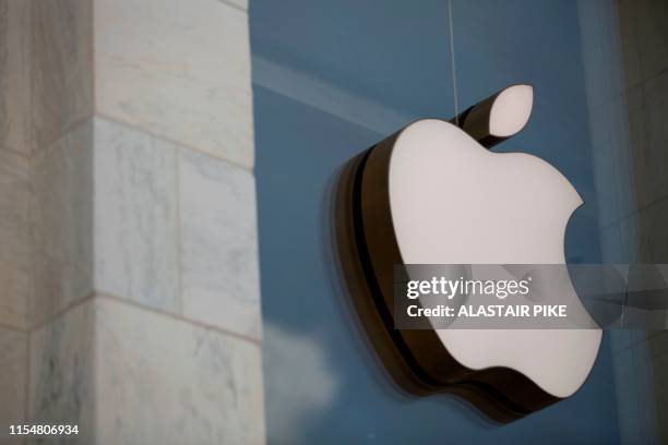 The Apple logo is seen outside the Apple Store in Washington, DC, on July 9, 2019.