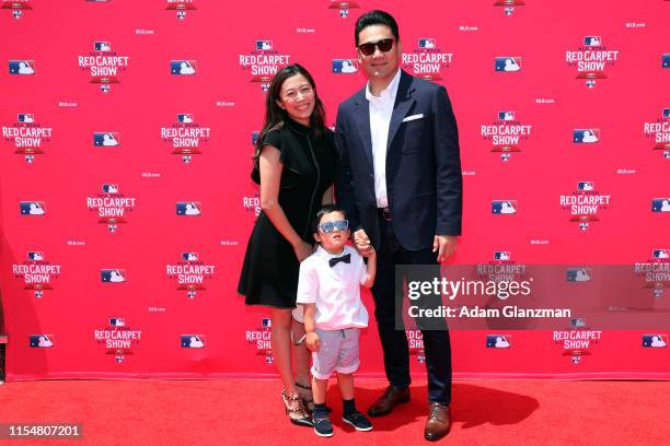 Masahiro Tanaka of the New York Yankees poses for a photo with his family during the MLB Red Carpet Show presented by Chevrolet at Progressive Field...