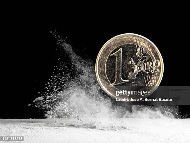 currency of an euro that falls down and produces an explosion. - devaluation stock pictures, royalty-free photos & images