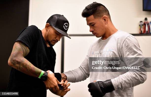 Maki Pitolo has his hands wrapped prior to his middleweight bout against Justin Sumter during Dana White's Contender Series at the UFC Apex on July...