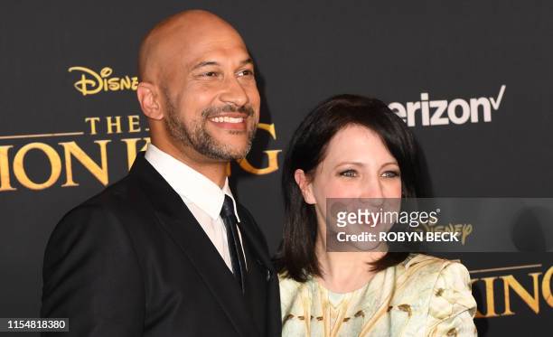 Actor Keegan-Michael Key and his wife US producer Elisa Key arrive for the world premiere of Disney's "The Lion King" at the Dolby theatre on July 9,...