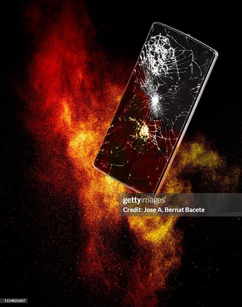 Mobile Phone With Broken Glass Exploding High-Res Stock Photo - Getty ...