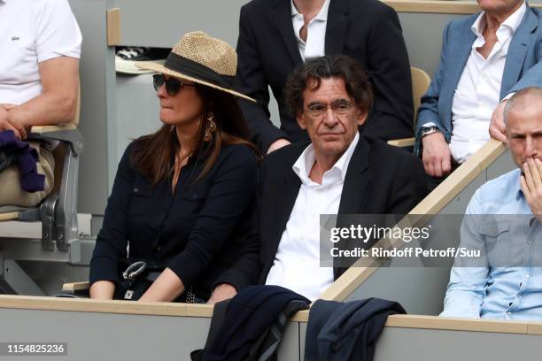 Politician Luc Ferry and his wife Marie-Caroline Becq de Fourquieres attend the 2019 French Tennis Open - Day Fifteen at Roland Garros on June 09,...