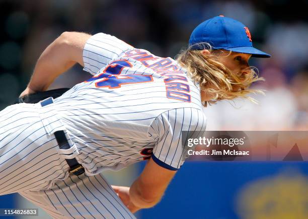 Noah Syndergaard of the New York Mets follows through on a pitch during the first inning against the Colorado Rockies at Citi Field on June 09, 2019...