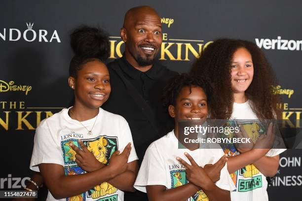 Actor Jamie Foxx , daughter Anelise and friends arrive for the world premiere of Disney's "The Lion King" at the Dolby theatre on July 9, 2019 in...