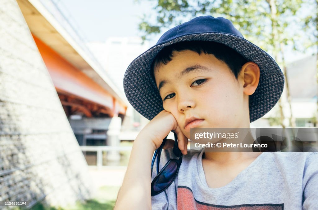 Boy wearing sun hat