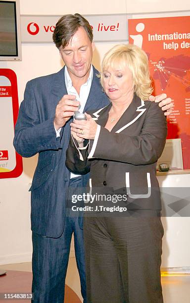Richard Madeley and Judy Finnigan during Richard and Judy Launch New Vodafone Service - Photocall at Vodafone Experience Store in London, Great...