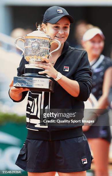 Ashleigh Barty of Australia celebrates victory with the trophy following the ladies singles final against Marketa Vondrousova of The Czech Republic...